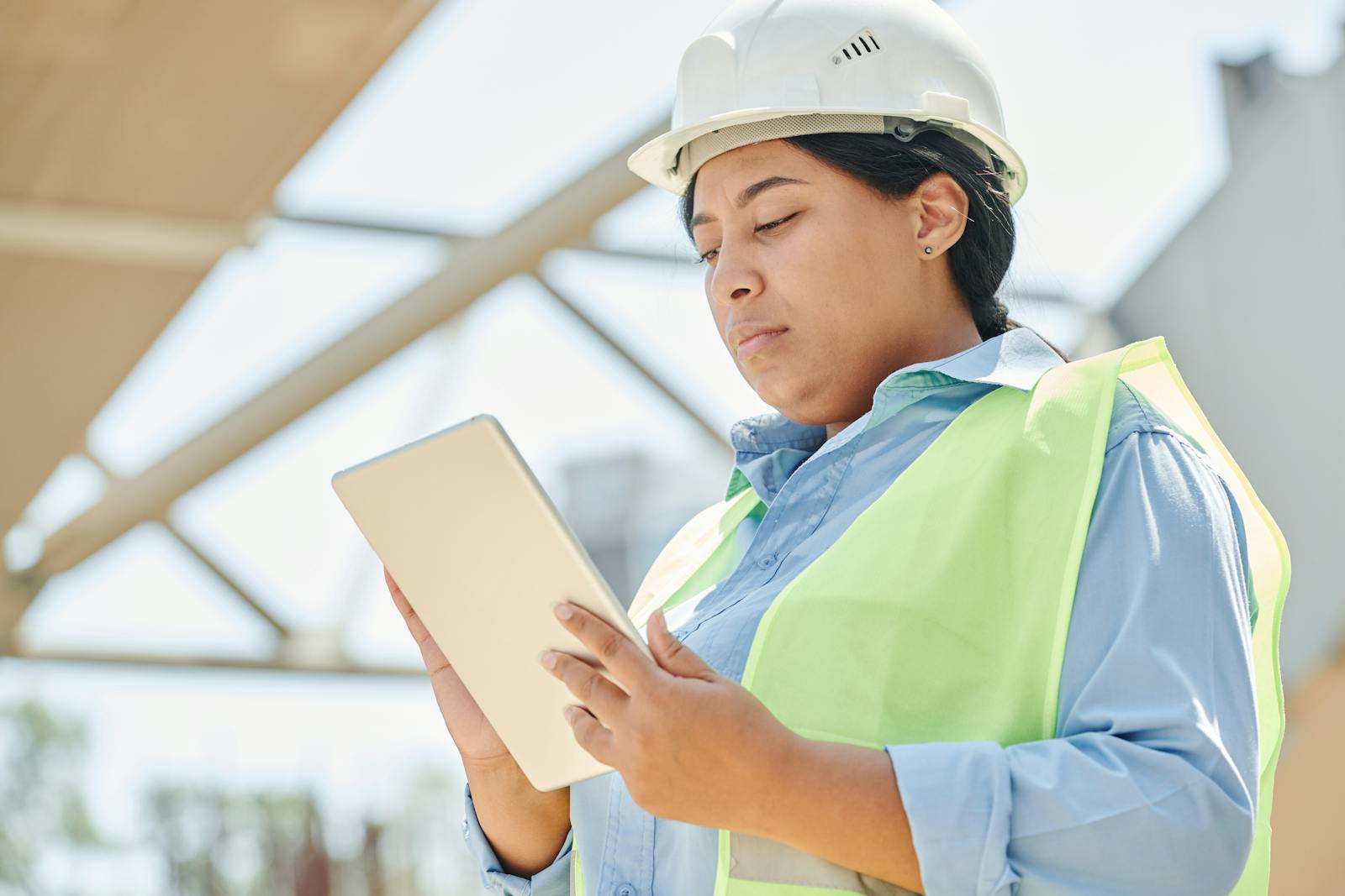 Nitro engineer using a digital monitoring tablet on-site